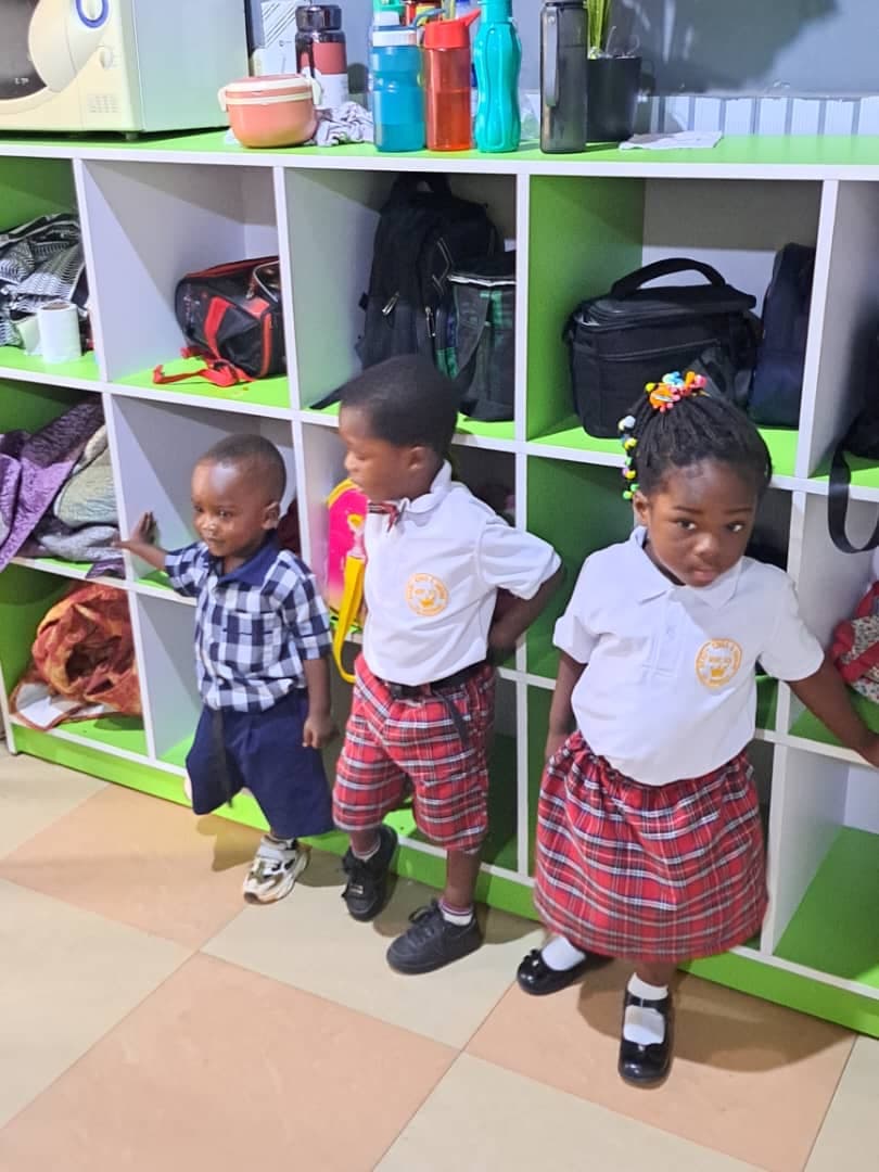 Pre-school students organising their belongings