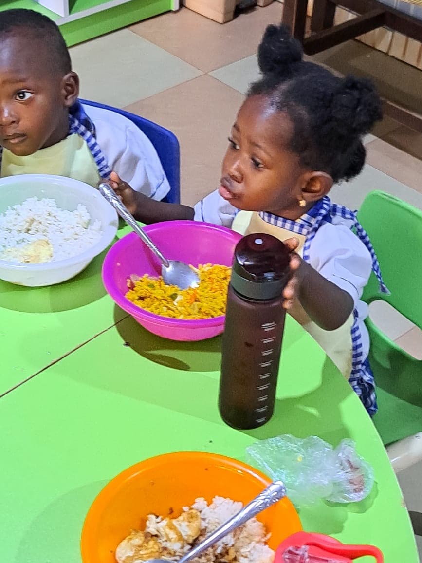 Pre-school children enjoying lunch at school